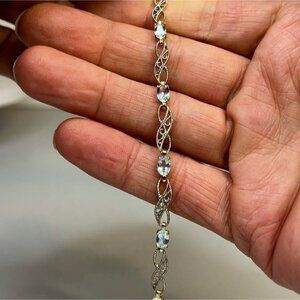 Classic Women's Silver Topaz Bracelet, 8 Beautiful Blue Stones, 7 1/2"